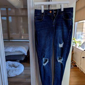Distressed Medium Wash Skinny Jeans
